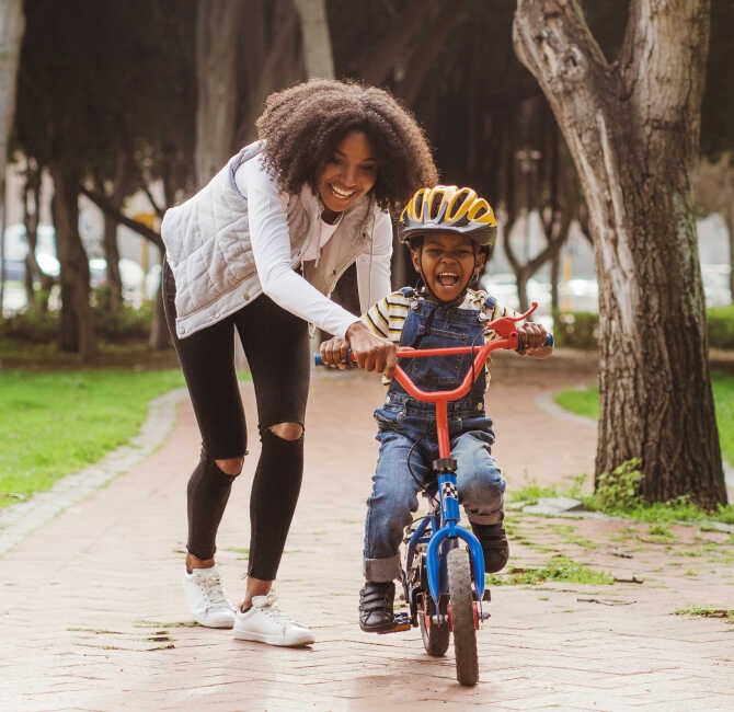 Mother with Child on a Bike